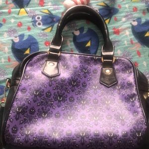 A Disney haunted mansion purse